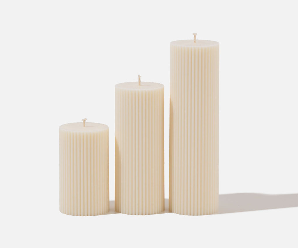 Wide column pillar candles - set of 3 on white background