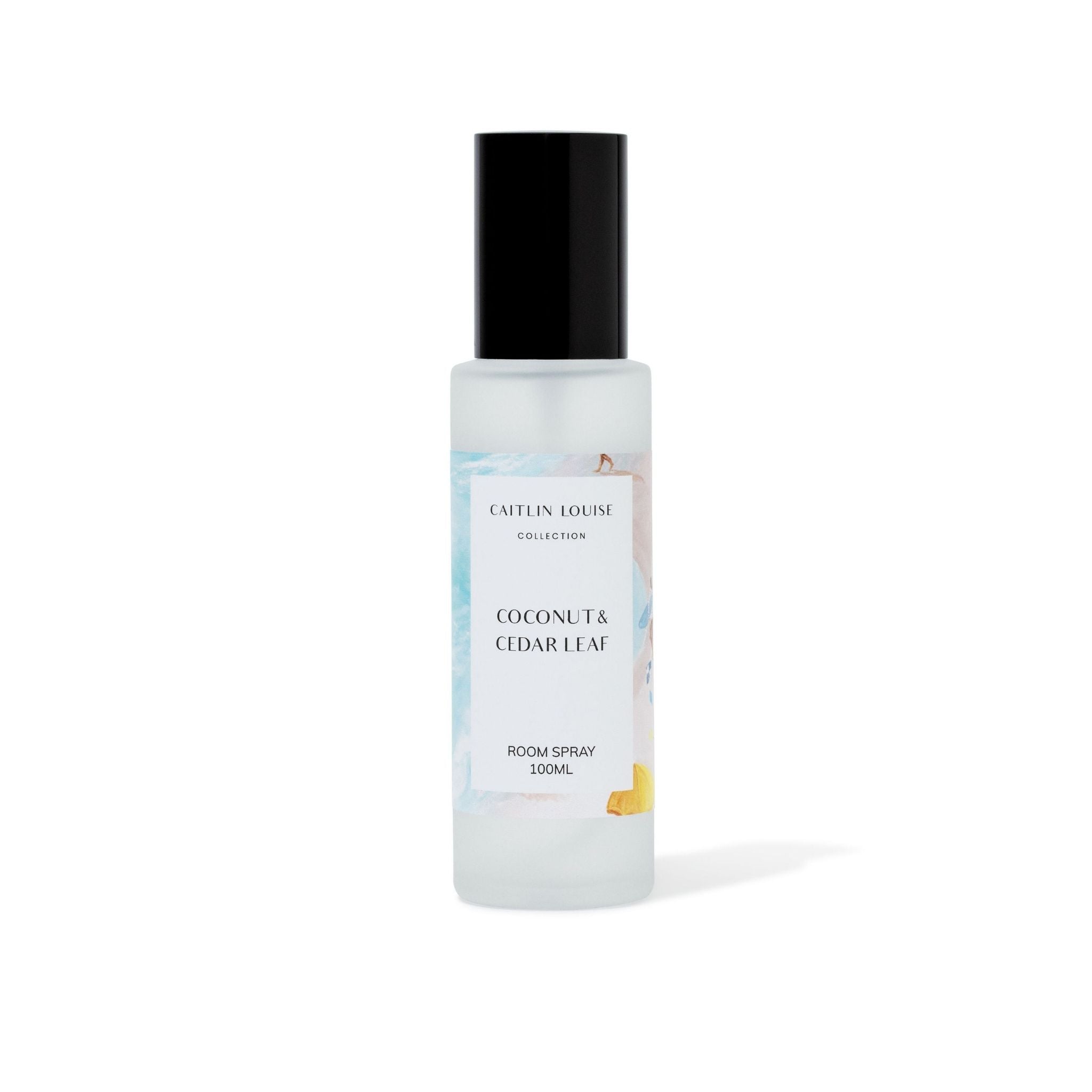 Room spray bottle with coconut and cedar leaf fragrance on a white background