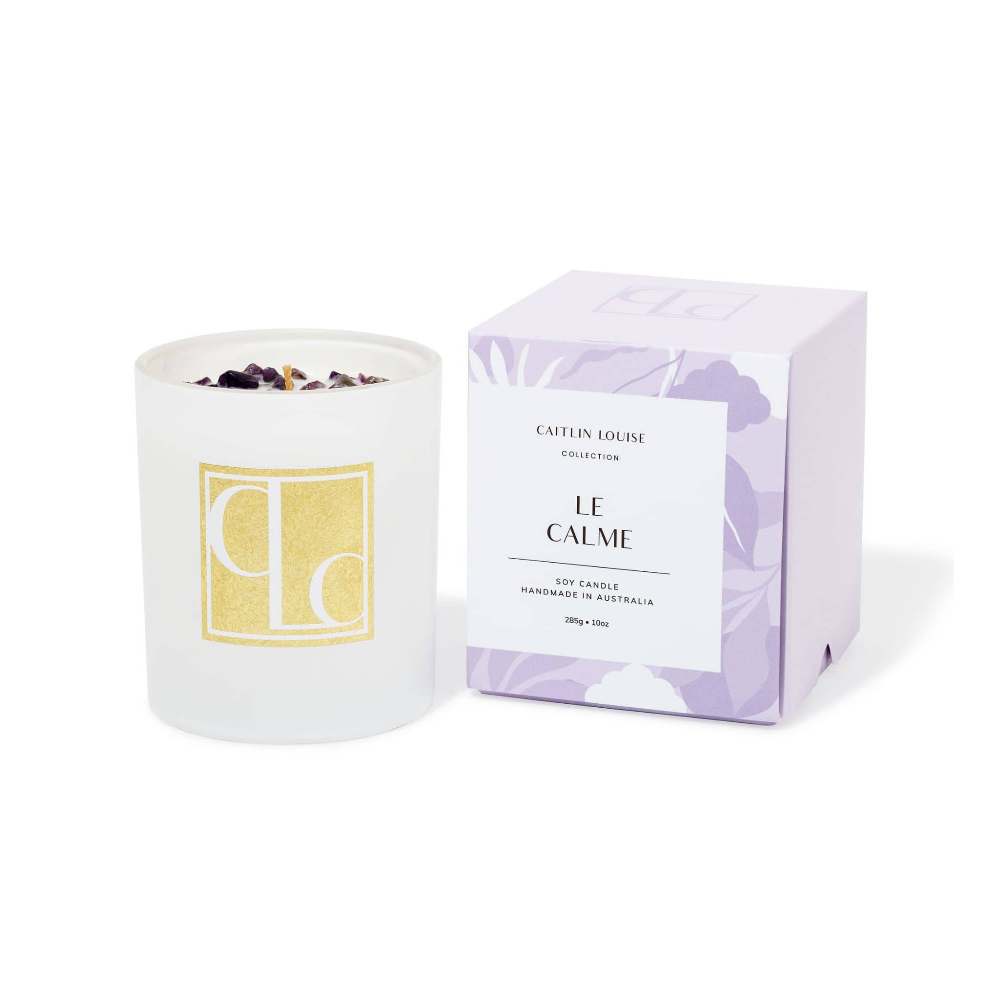Lavender crystal infused Candle with packaging labeled 'Le Calme' on a white background