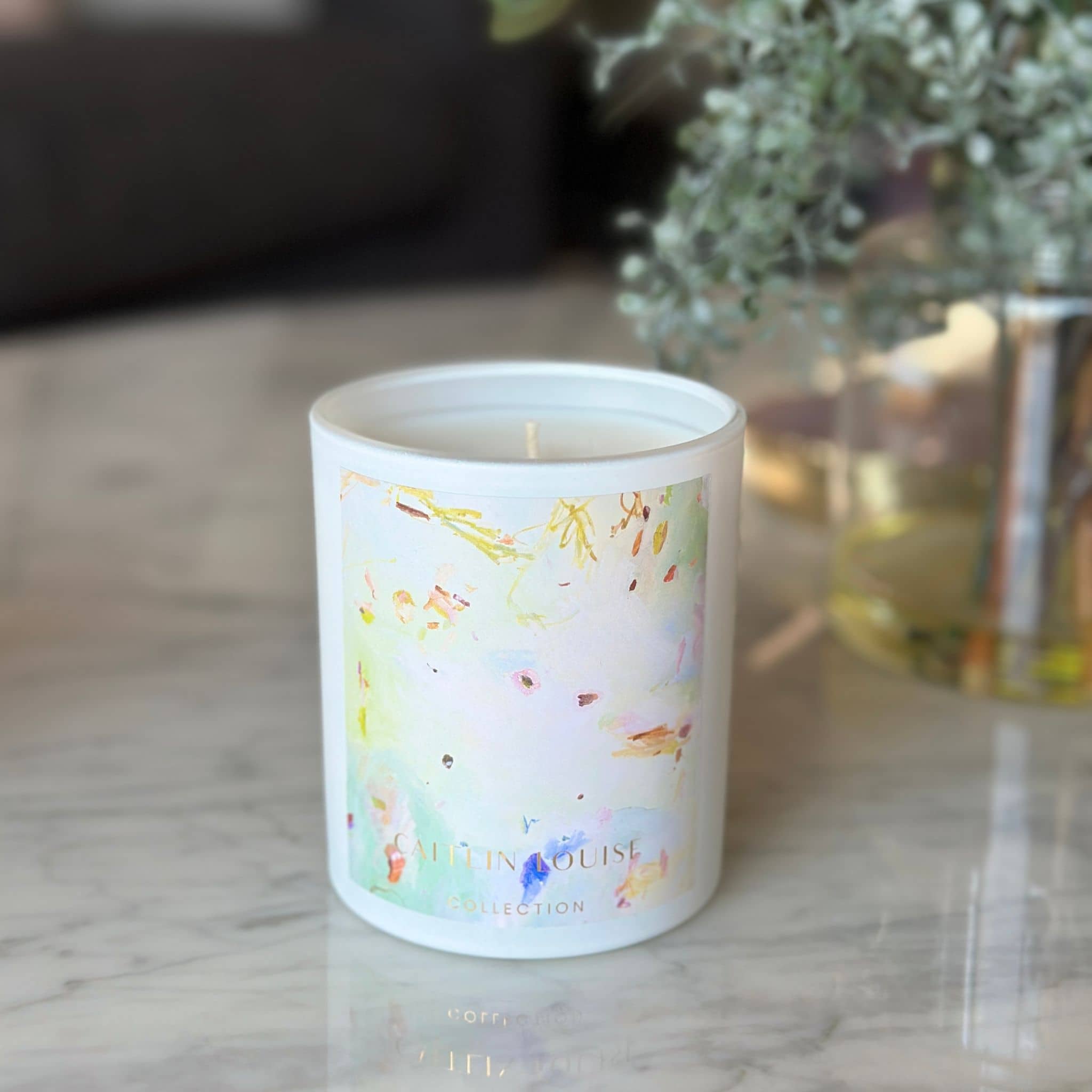 Lemongrass and Tahitian Lime Candle styled on coffee table