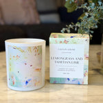 Caitlin Louise Collection's Lemongrass and Tahitian Lime Candle - styled with box on coffee table