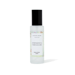 Lemongrass and Tahitian Lime Room spray bottle with black cap and white label on a white background