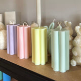 Blossom pillar candles - pastel colours on shelf