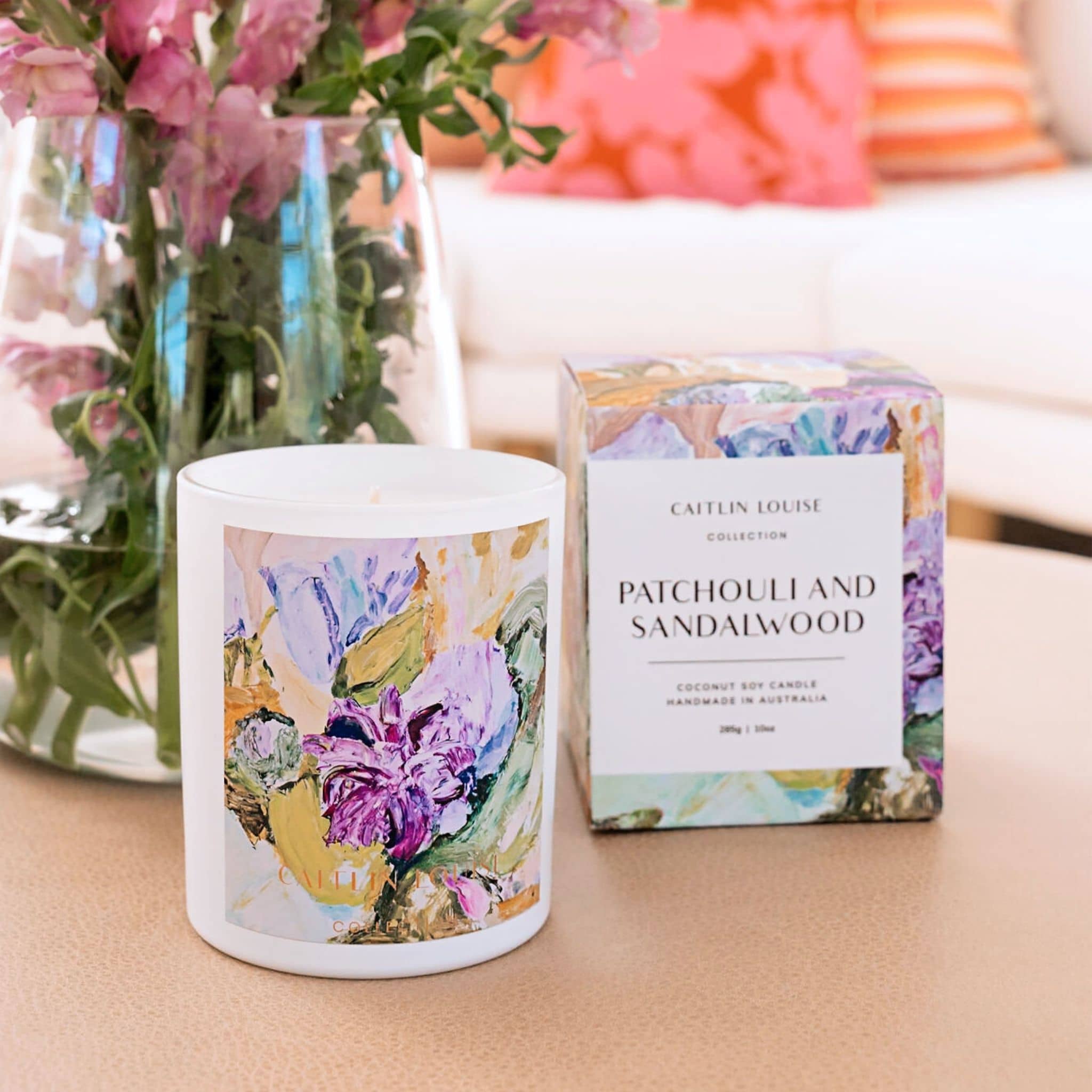 Caitlin Louise Collection Patchouli and Sandalwood Annie Everingham Artist Candle- styled with flowers