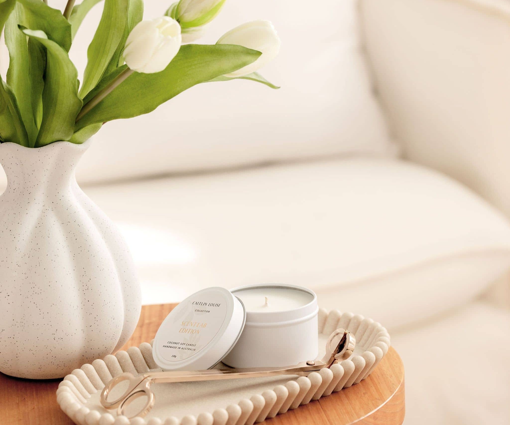 Scent Lab Edition candle on tray - styled in lounge room