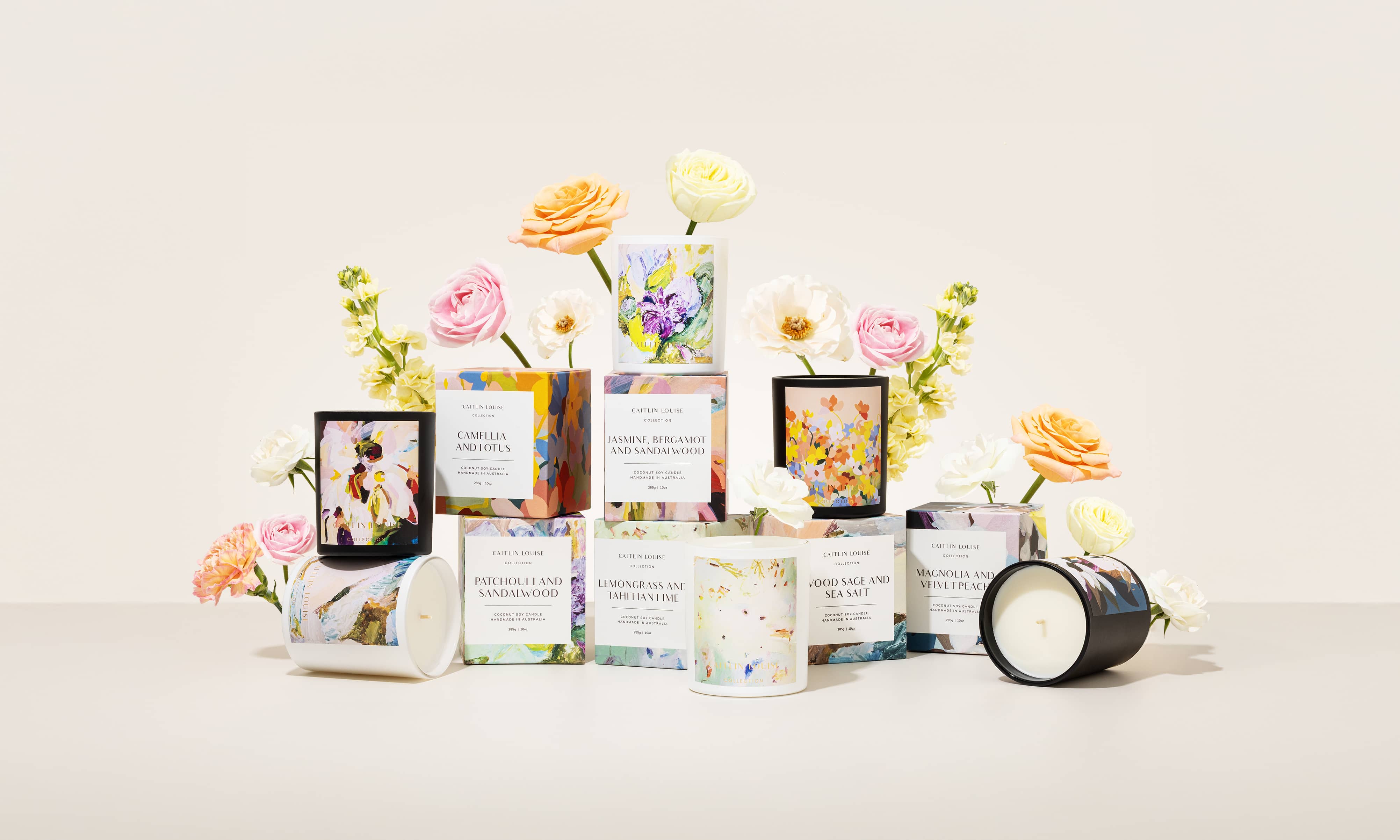 Caitlin Louise Collection Artist Candle Collection - Jasmine, Bergamot and Sandalwood candle on coffee table