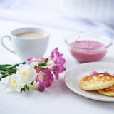 Freesias with coffee and pancakes