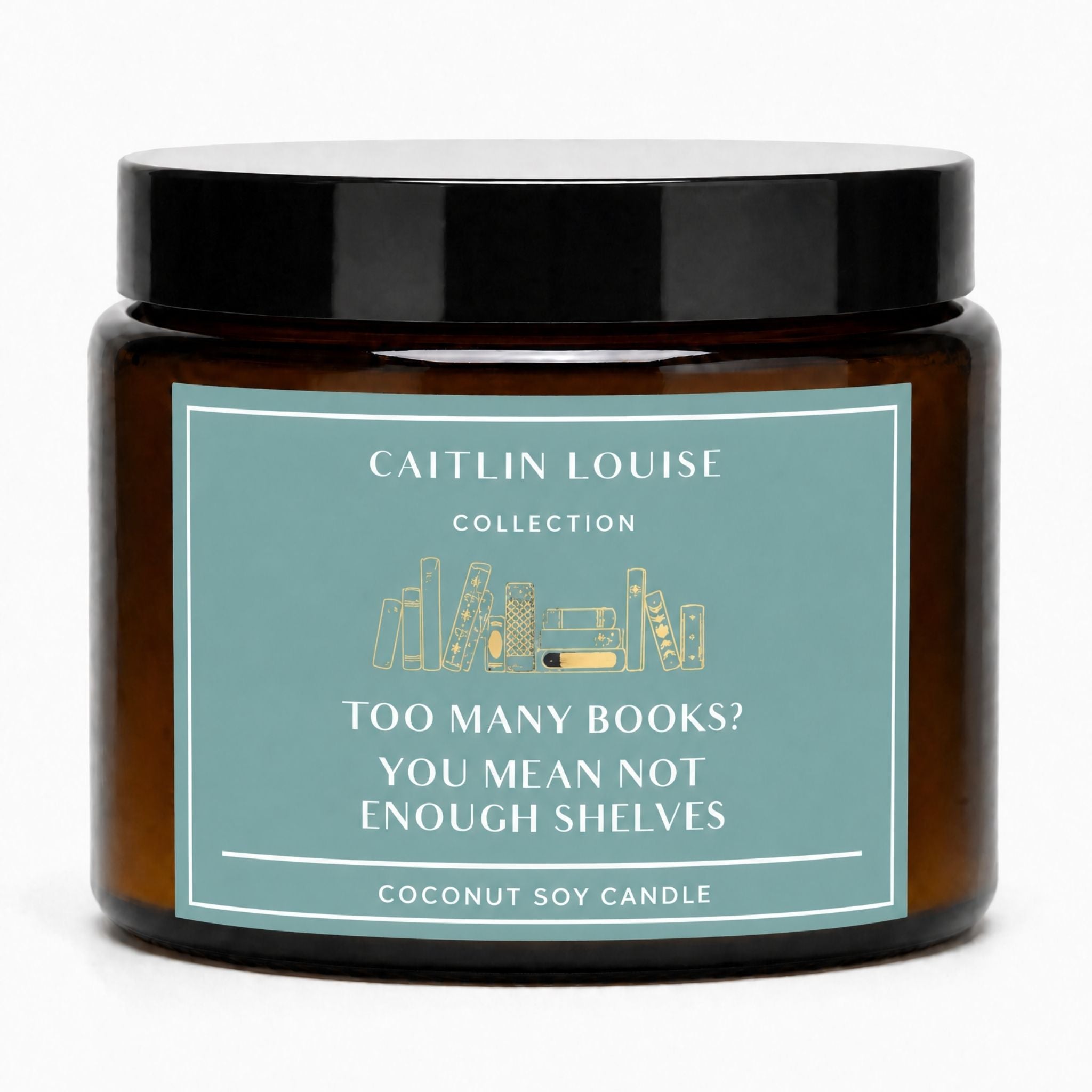 Amber glass jar candle with a black lid and a dusty teal label that reads 'CAITLIN LOUISE COLLECTION' and 'TOO MANY BOOKS? YOU MEAN NOT ENOUGH SHELVES'.