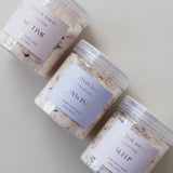 Caitlin Louise Collection bath salts showing flat lay of all three types - Unwind, Me Time and Sleep.