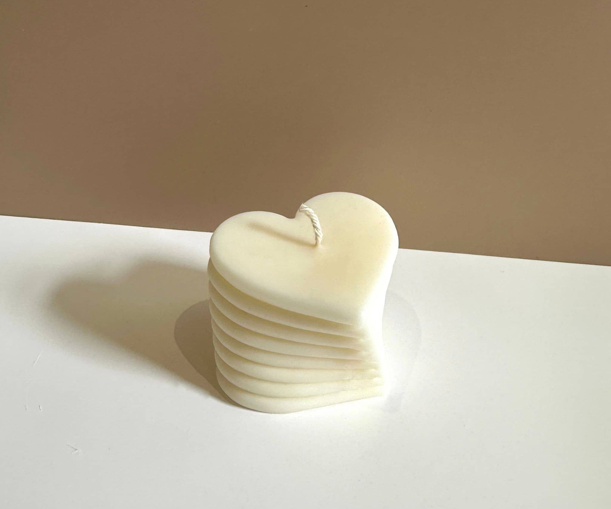 Caitlin Louise Collection's Adora heart sculptural candle - brown background