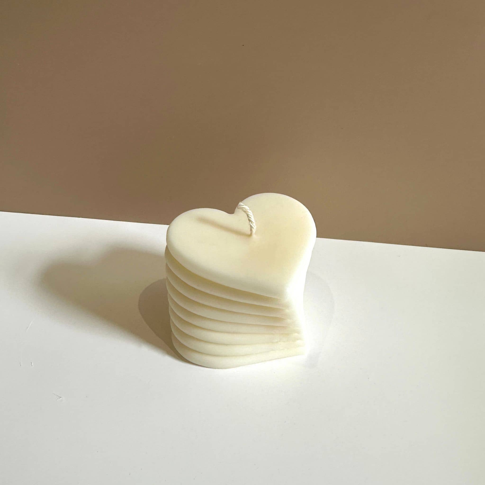 Caitlin Louise Collection's Adora heart sculptural candle - brown background