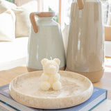 Caitlin Louise Collection Aria Sculptural Candle styled on coffee table on a tray with jugs in background