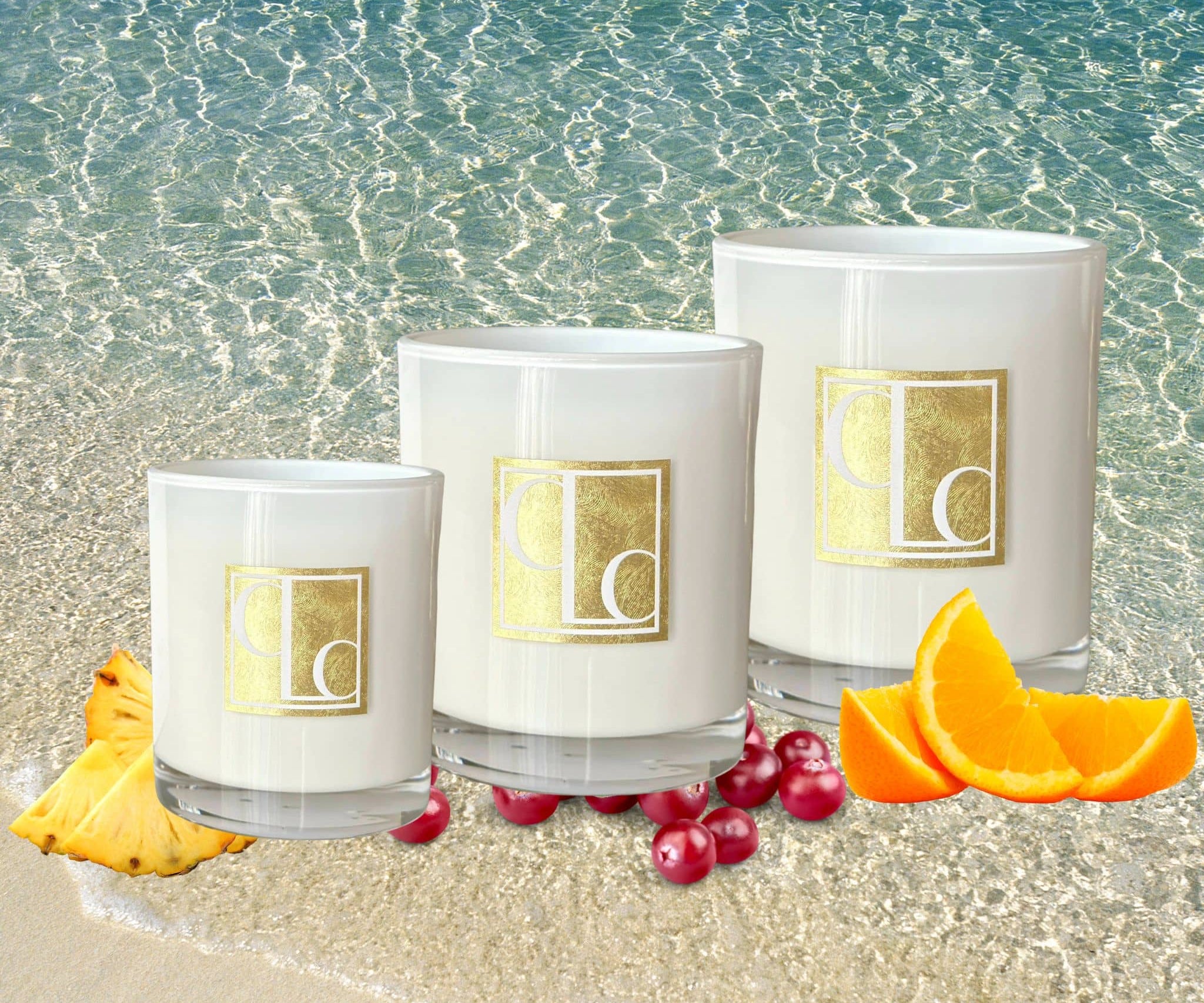 Caitlin Louise Collection Australian Summer Scented candle - 3 sizes on beach water background