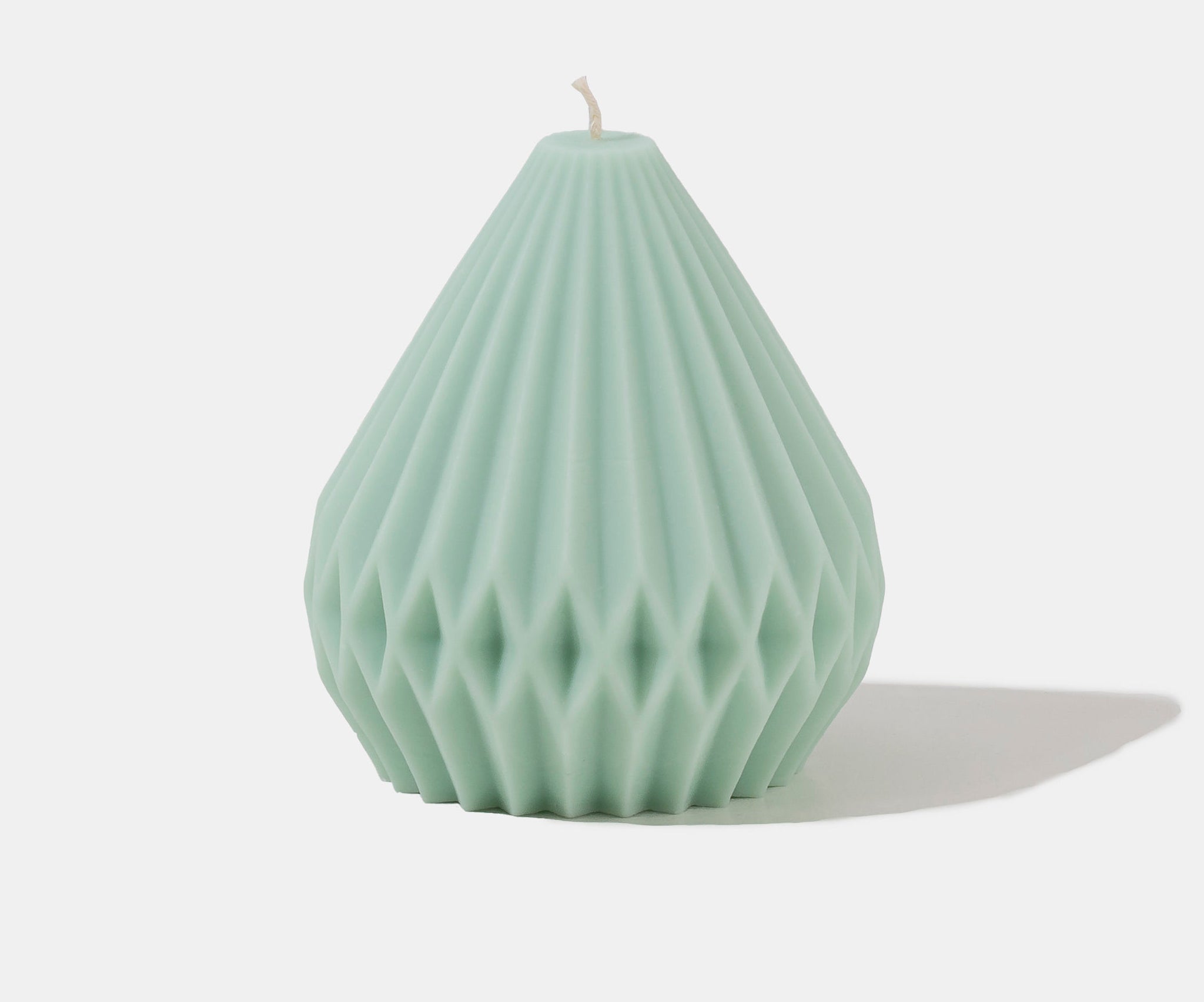 Caitlin Louise Collection Green pear shaped sculptural candle - front view - white background