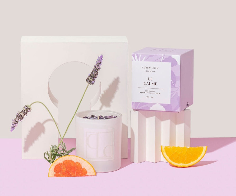 calming candle shown with scent note ingredients lavender, grapefruit, citrus