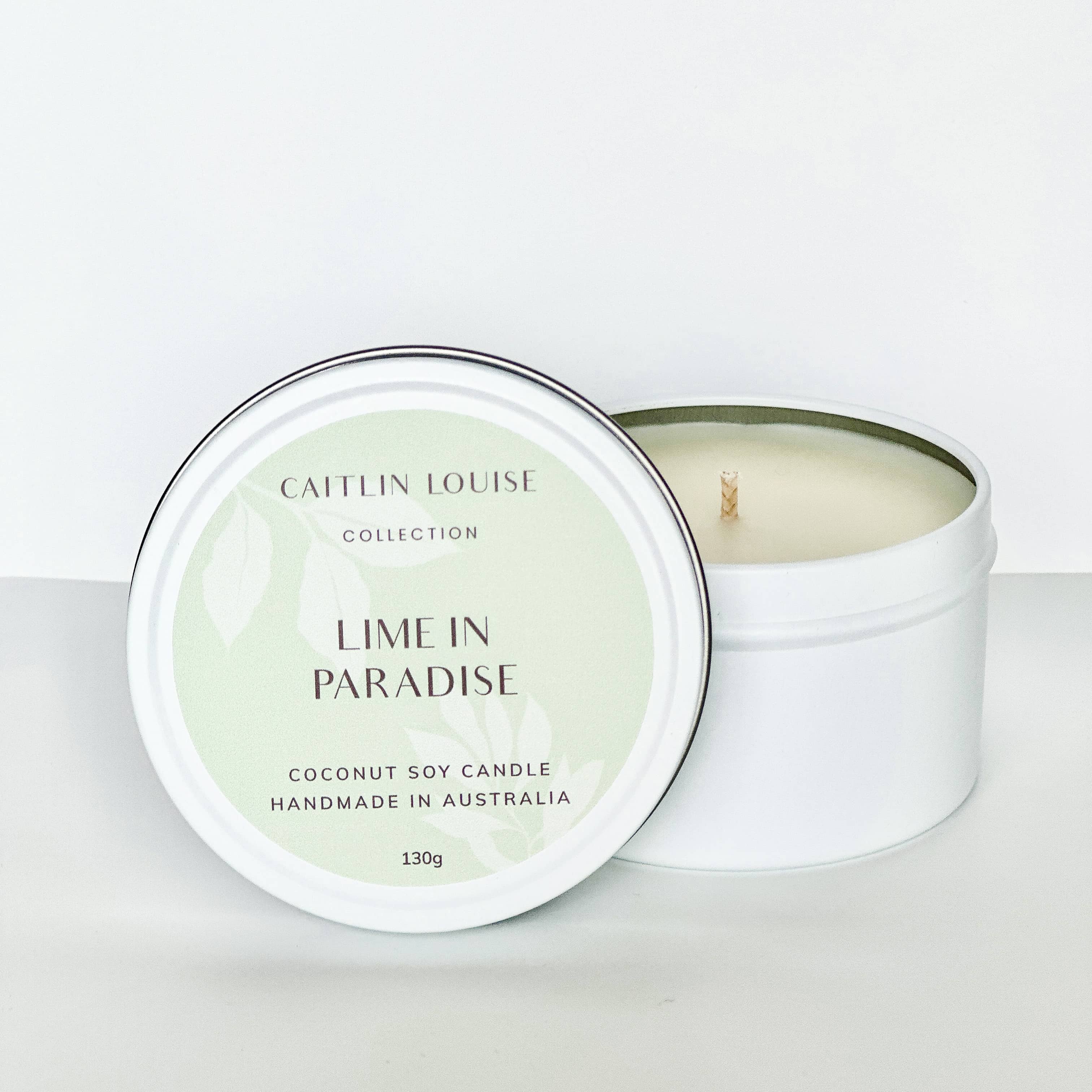 Lime in Paradise travel tin candle - white background