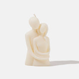 Lovers embrace candle - front view - white background