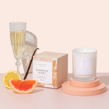 Luxury candle - champagne sunset - styled with ingredients