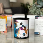 Caitlin Louise Collection artist candle on marble coffee table