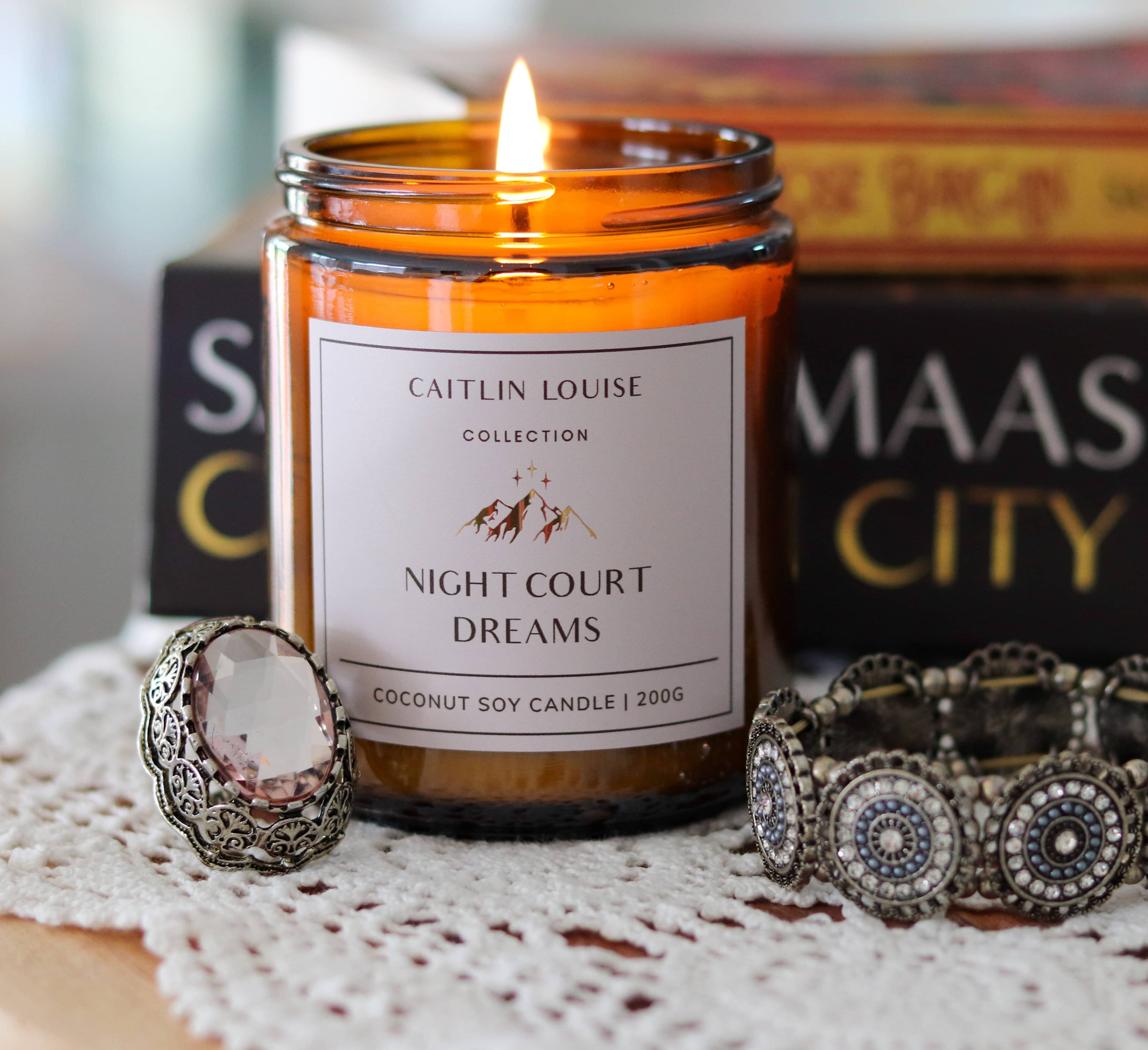 Night Court Dreams book inspired candle - styled with jewellery and books