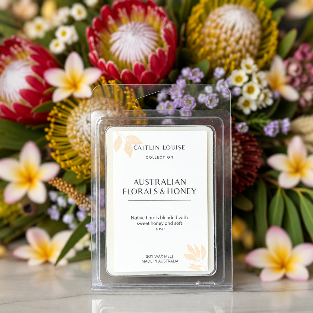 Native florals and honey wax melt with Australian native flowers in background