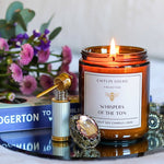 Caitlin Louise Collection Whispers of the Ton candle - UGC photo styled on mirrored tray with flowers and jewellery