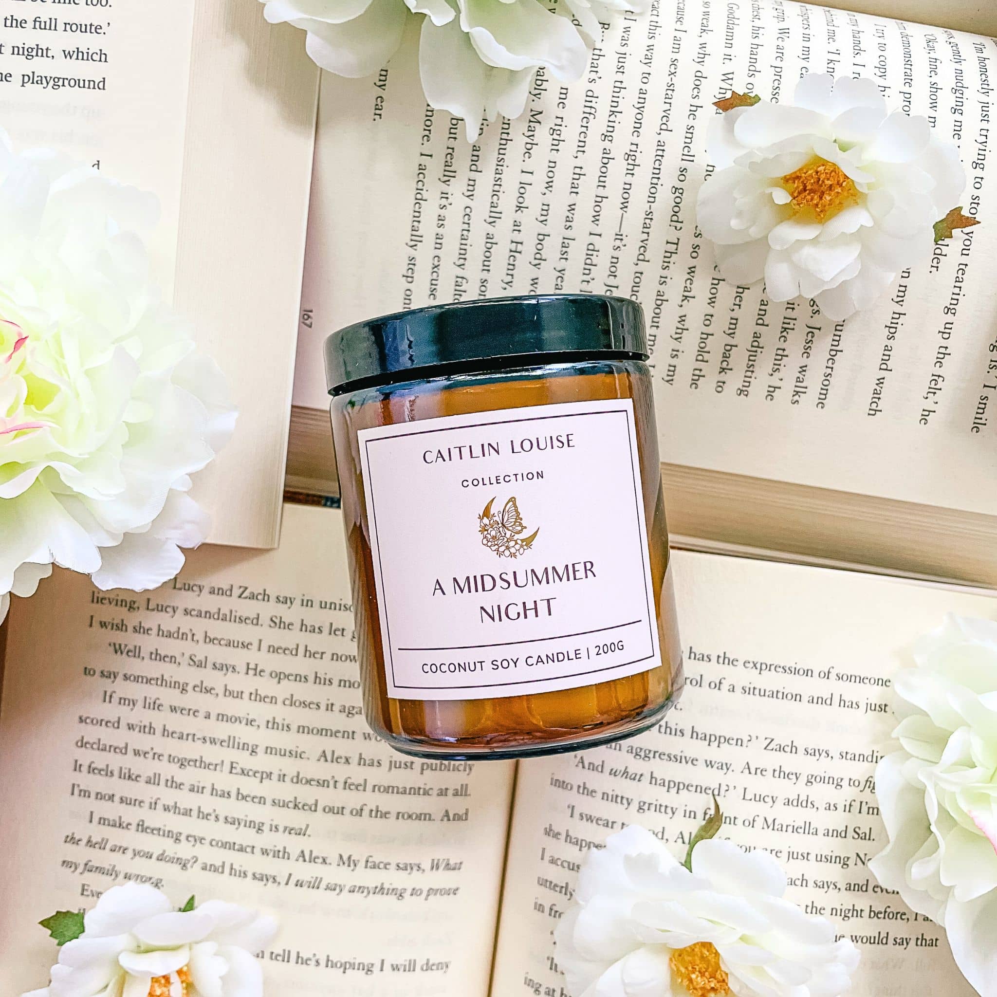 Caitlin Louise Collection A Midsummer Night Bookish candle - UGC photo styled on books with flowers