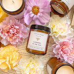 Caitlin Louise Collection Whispers of the Ton Bookish candle - UGC photo styled with books and flowers