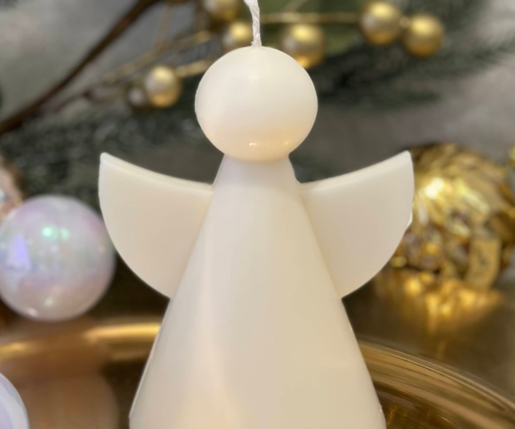 Christmas angel pillar candle on gold plate