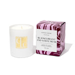 Caitlin Louise Collection candle with a light purple and maroon patterned box labeled 'Blackcurrant and White Musk' on a white background.