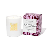 Caitlin Louise Collection candle with a light purple and maroon patterned box labeled 'Blackcurrant and White Musk' on a white background.