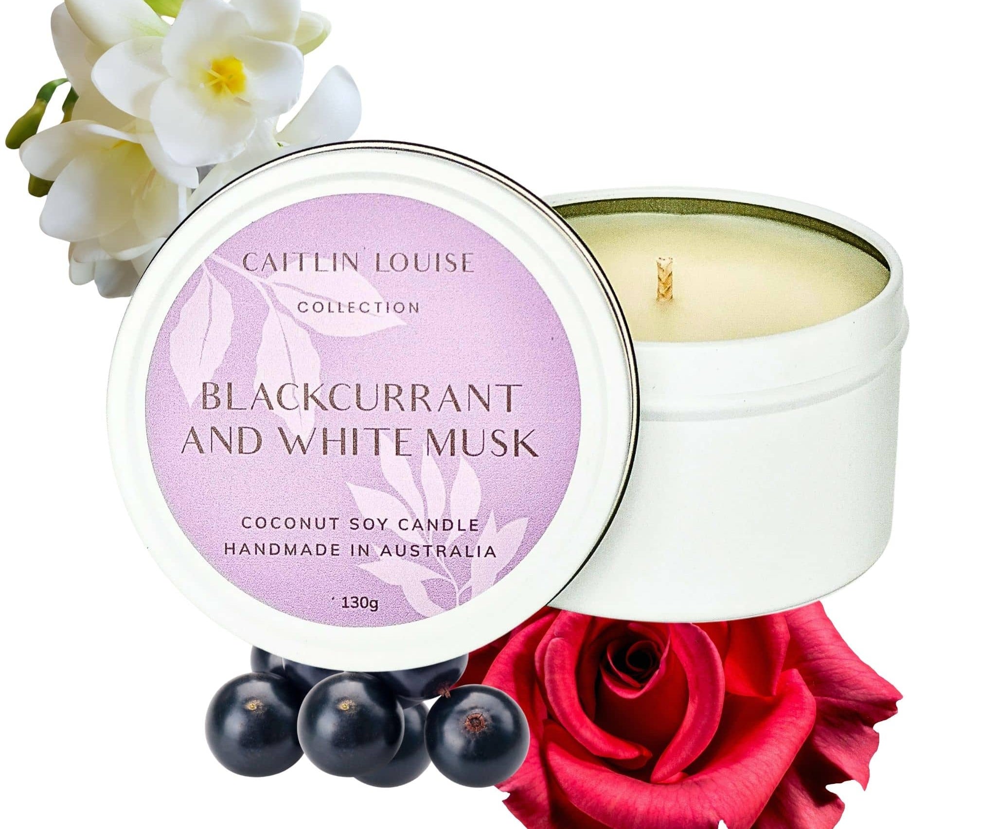 Blackcurrant and white musk scented travel tin candle - white background