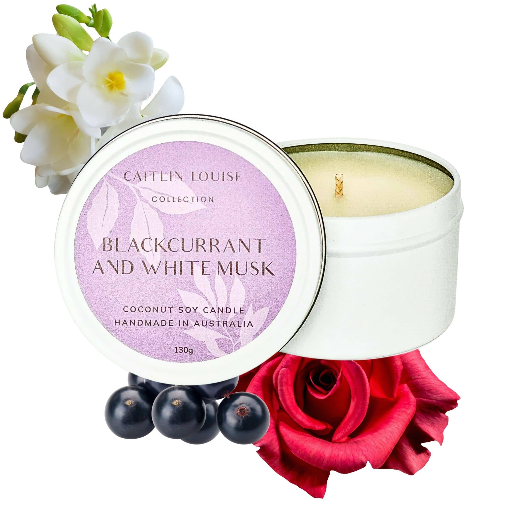 Blackcurrant and white musk scented travel tin candle - white background