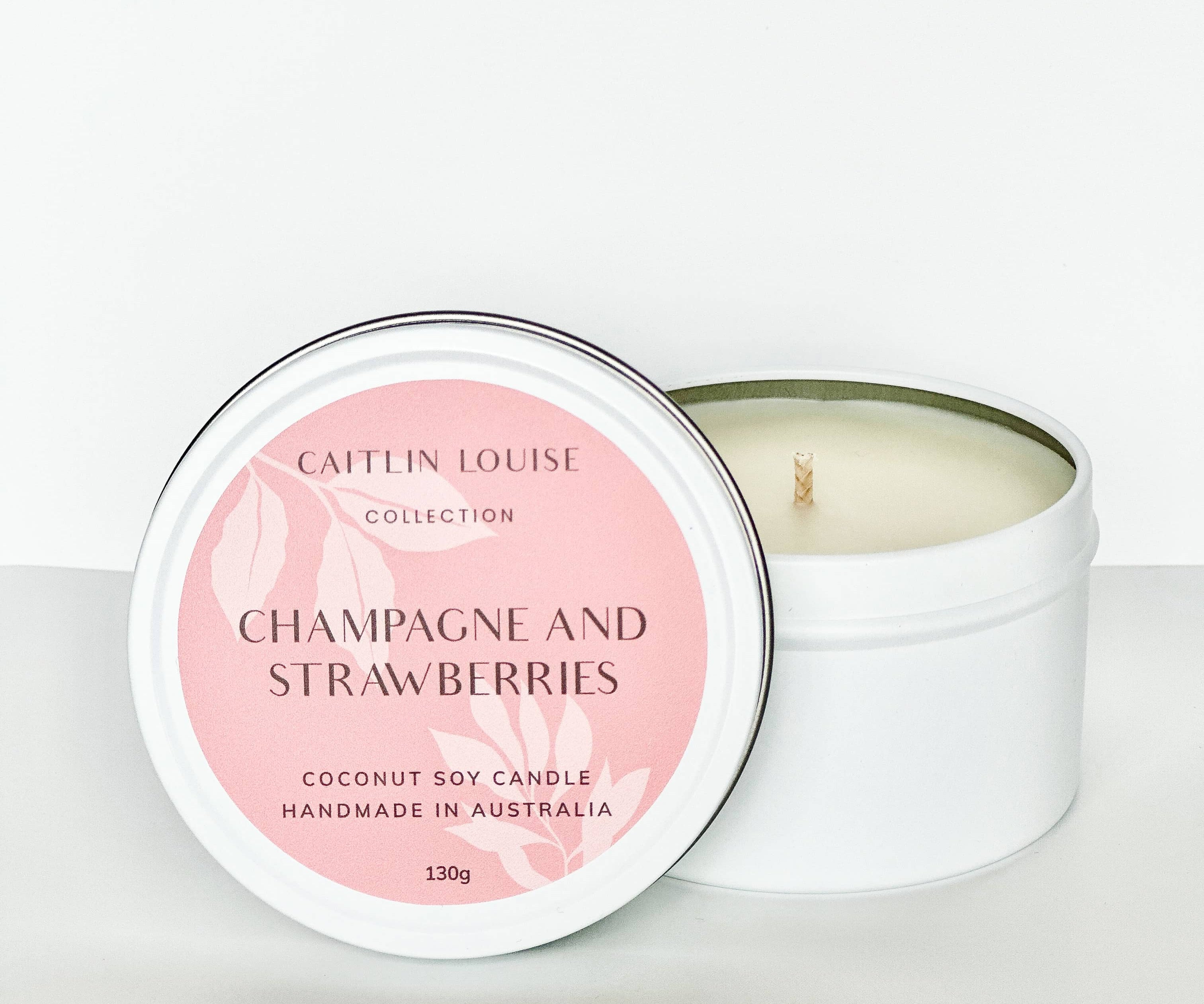 Champagne and Strawberries travel tin candle - white background