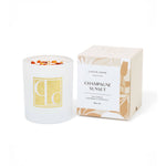 Crystal infused soy Candle with decorative packaging labeled 'Champagne Sunset' on a white background