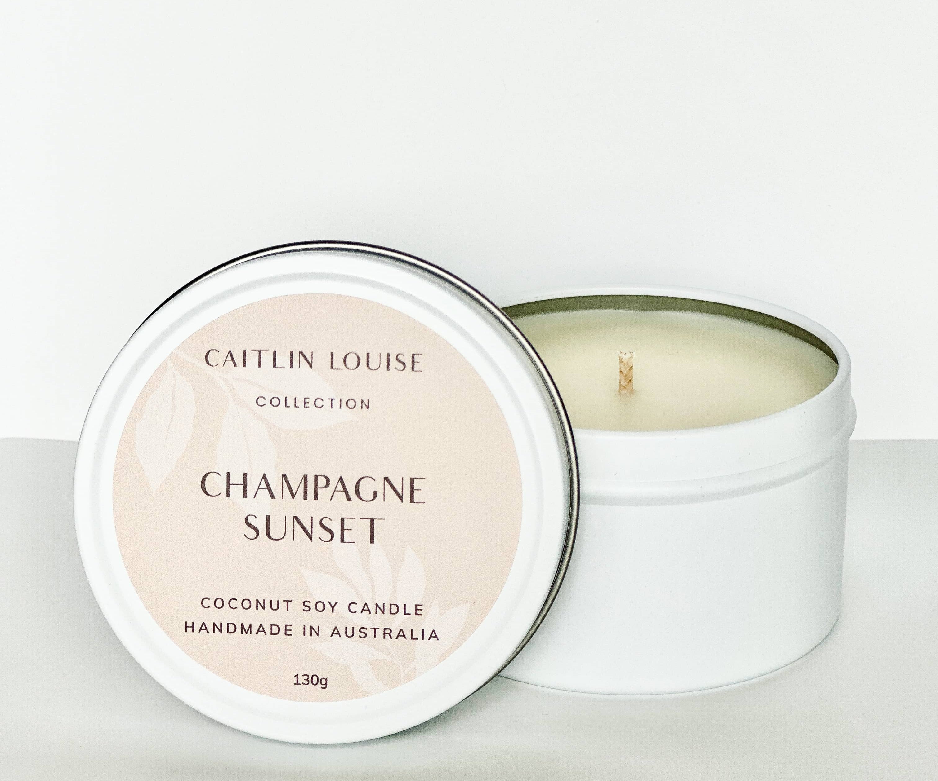 Champagne Sunset travel tin candle - white background