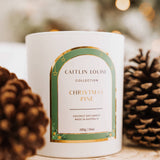 Caitlin Louise Collection Christmas Pine scented candle styled with pine cones