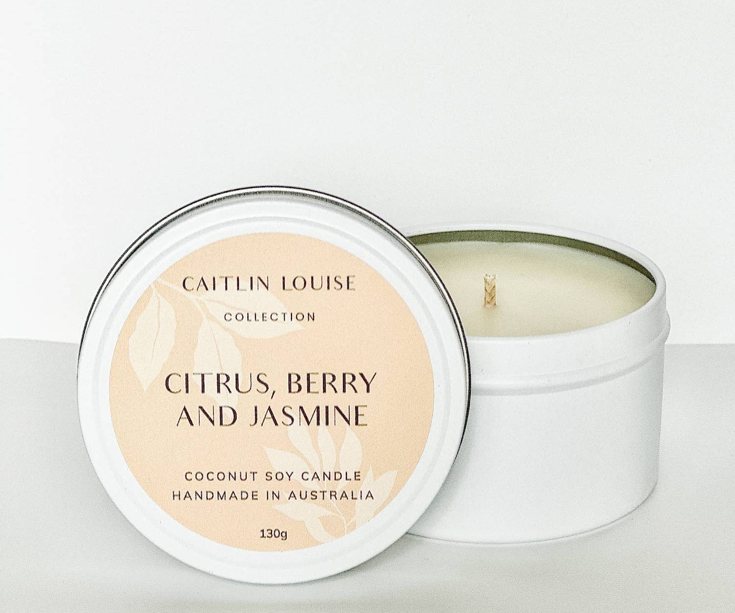 Citrus Berry and Jasmine Travel tin candle - white background