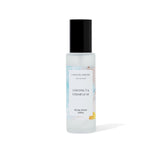 Room spray bottle with coconut and cedar leaf fragrance on a white background
