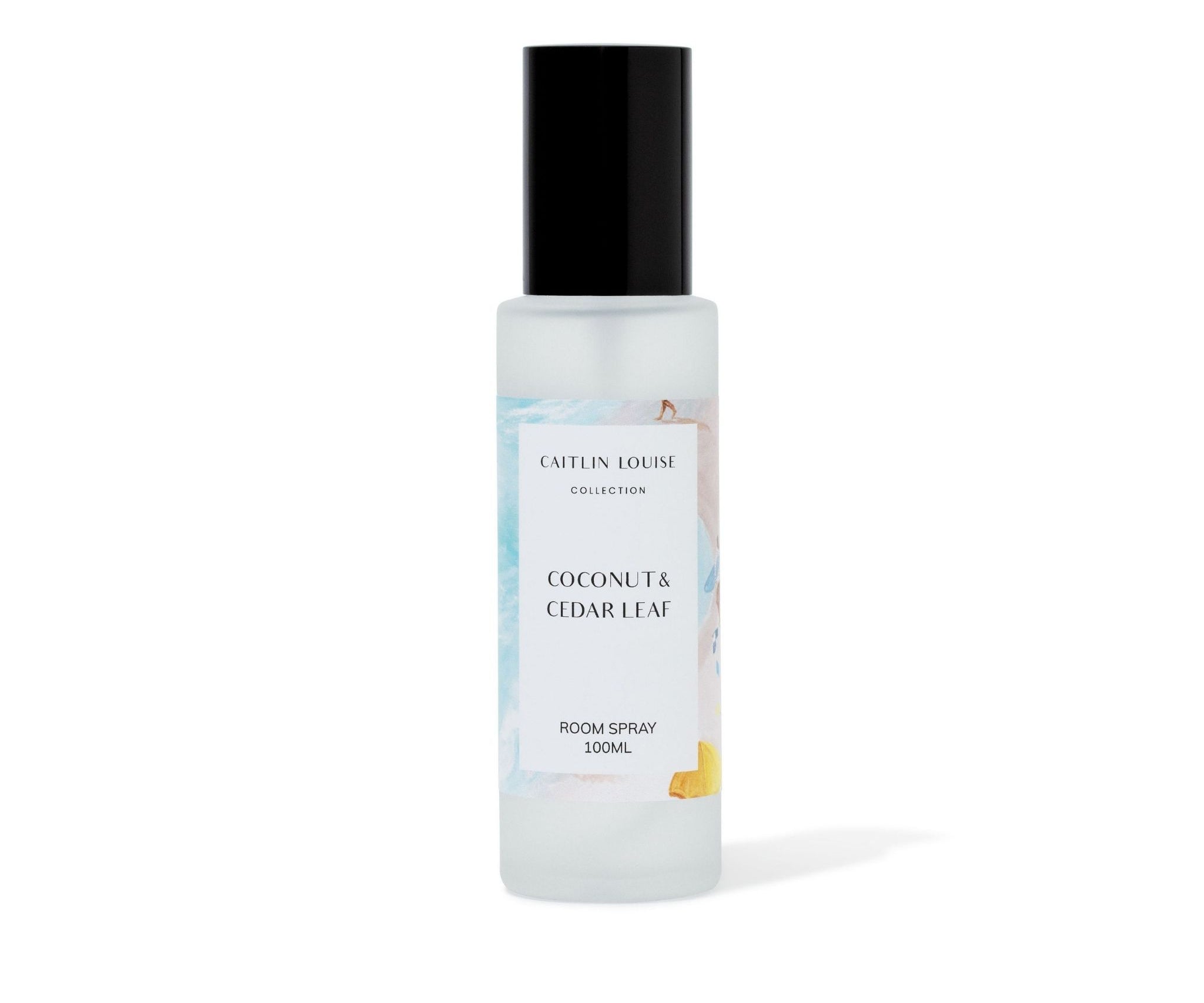 Room spray bottle with coconut and cedar leaf fragrance on a white background