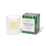 Caitlin Louise Collection candle with a green and white box labeled 'Green Fig and Teakwood' on a white background