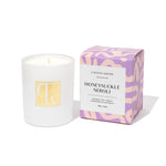 Caitlin Louise Collection candle with packaging labeled 'Honeysuckle Neroli' on a white background