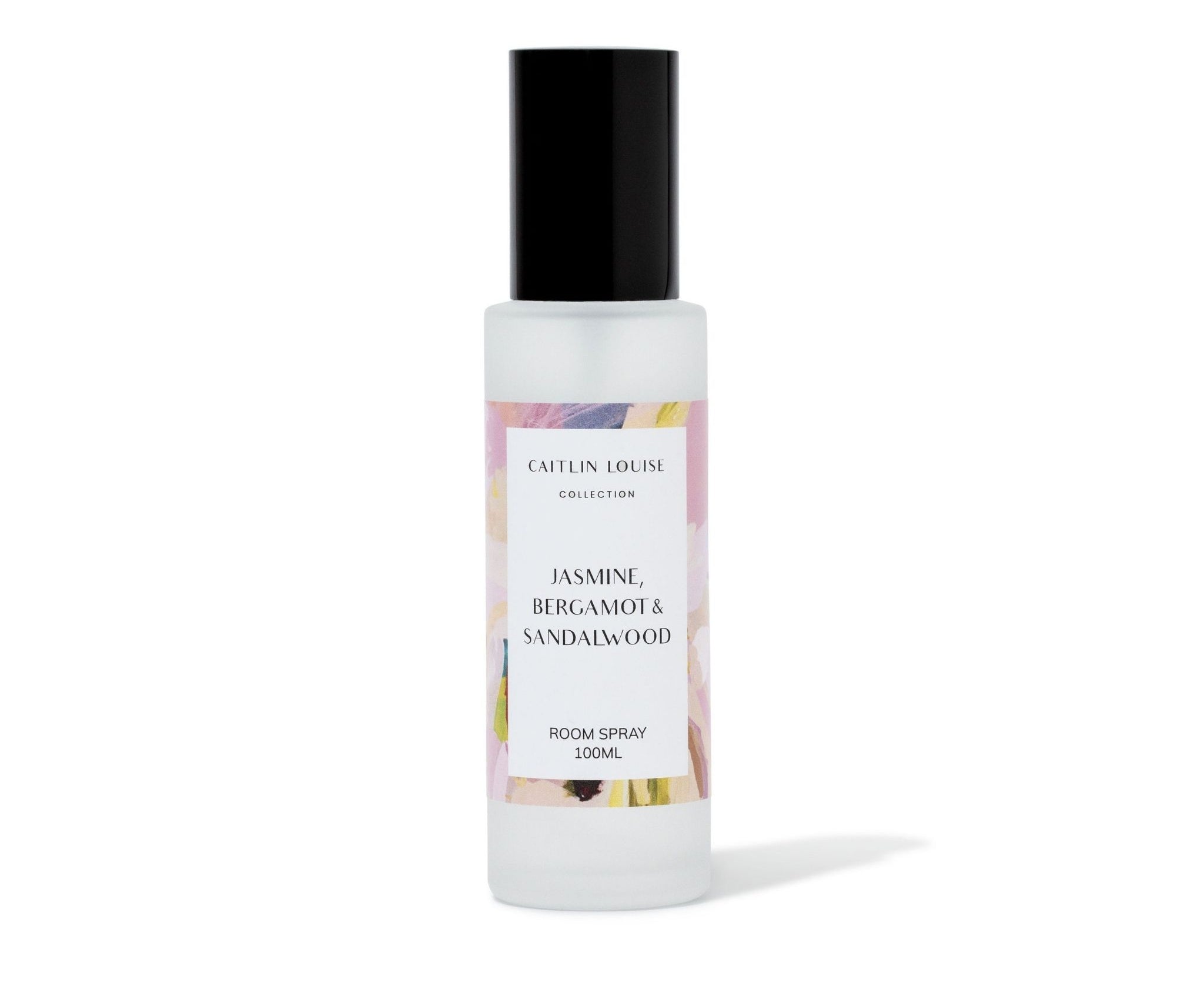 Room spray bottle with colorful label on a white background
