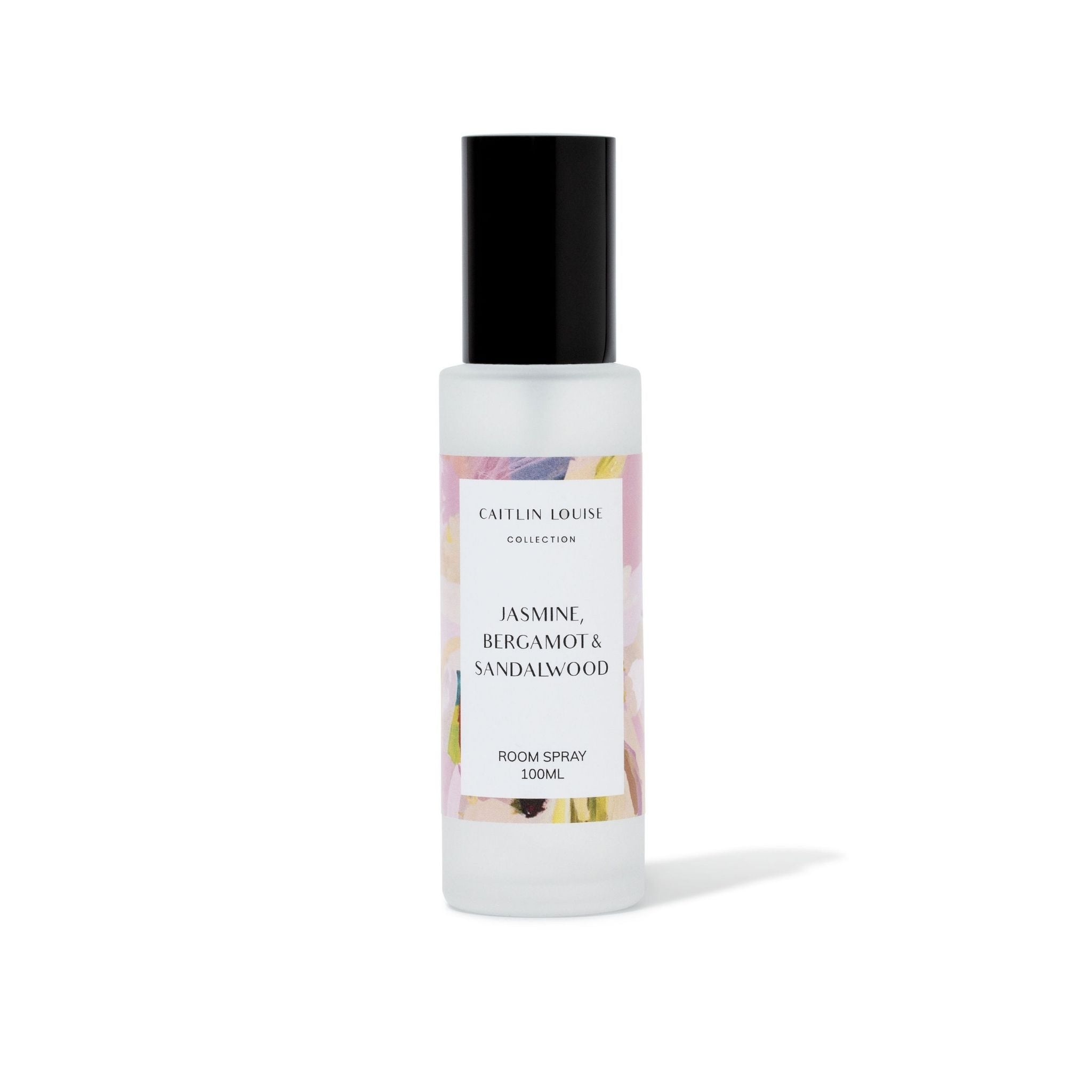Room spray bottle with colorful label on a white background