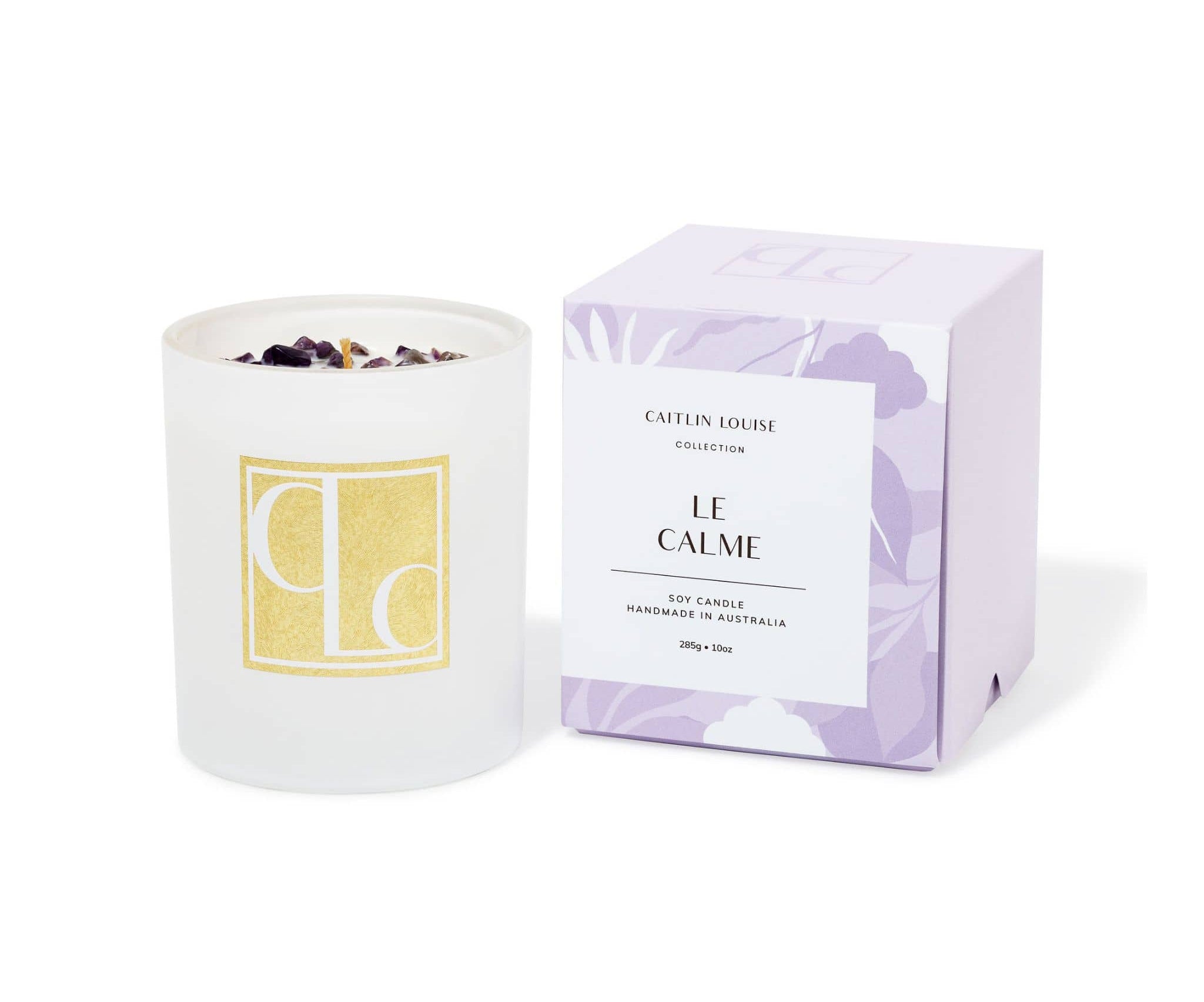 Lavender crystal infused Candle with packaging labeled 'Le Calme' on a white background