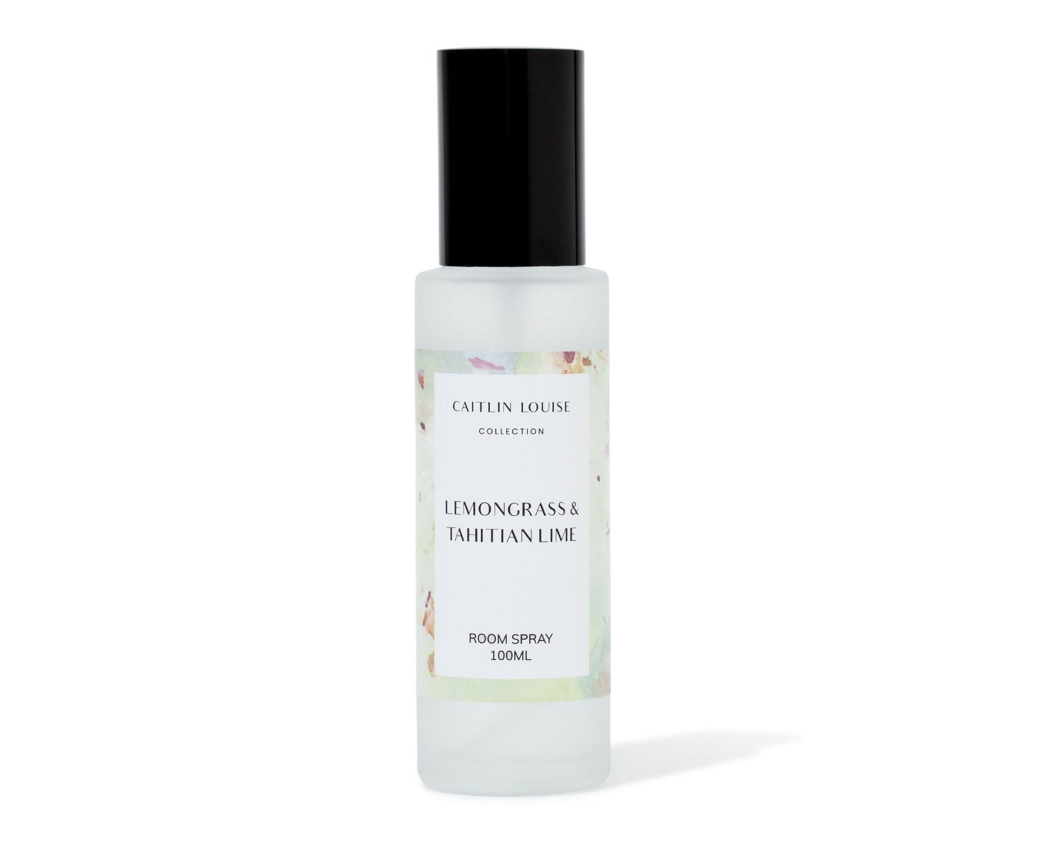 Lemongrass and Tahitian Lime Room spray bottle with black cap and white label on a white background