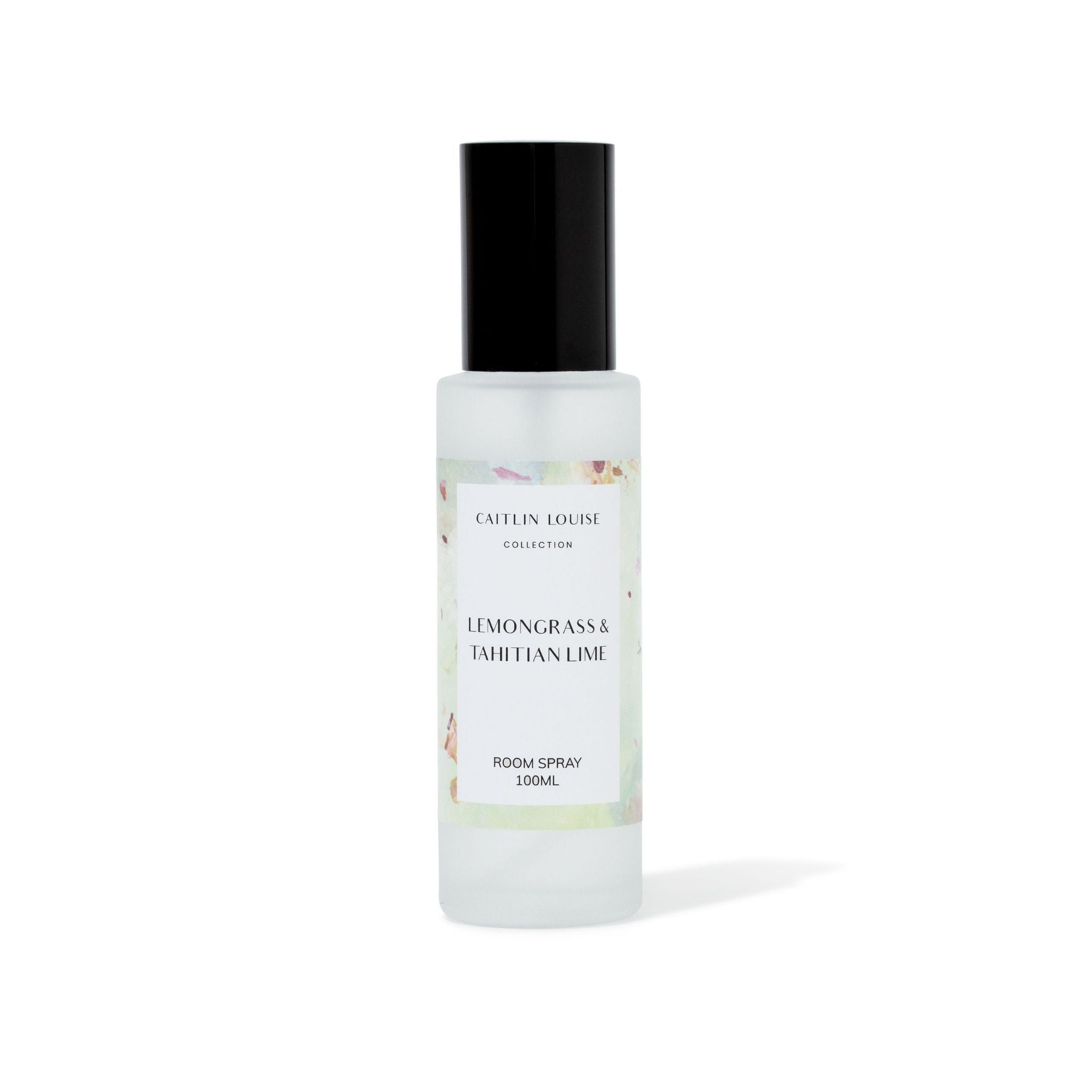Lemongrass and Tahitian Lime Room spray bottle with black cap and white label on a white background