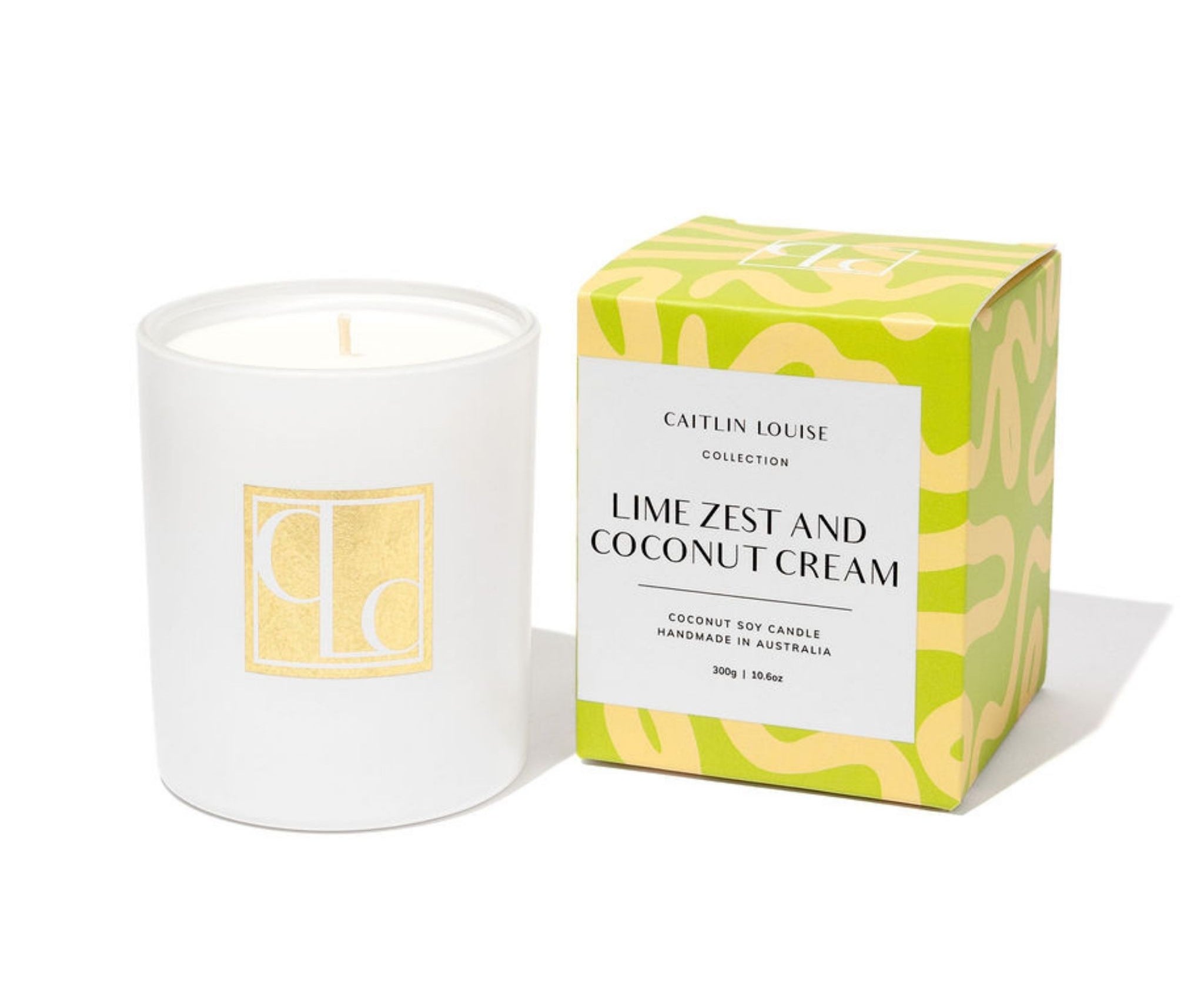 Candle with packaging labeled 'Lime Zest and Coconut Cream' from the Caitlin Louise Collection on a white background.