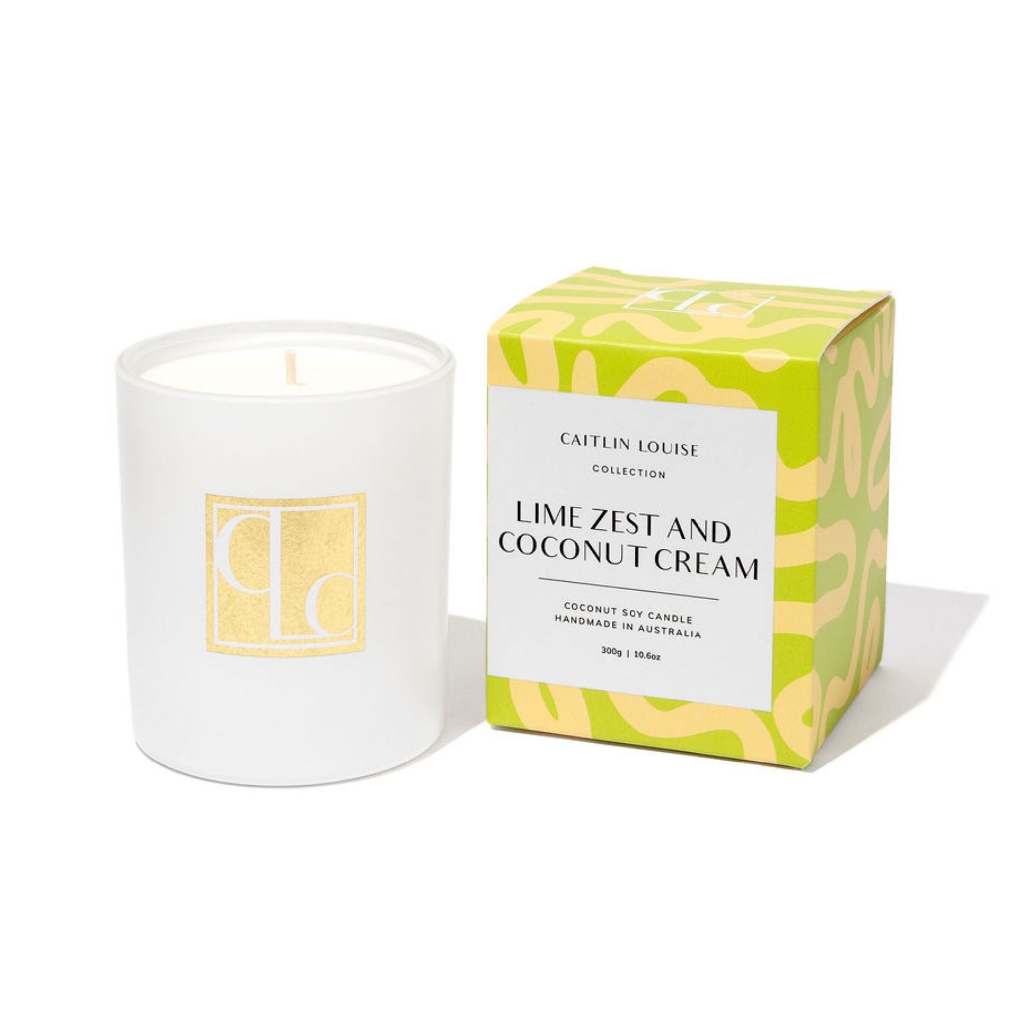 Candle with packaging labeled 'Lime Zest and Coconut Cream' from the Caitlin Louise Collection on a white background.
