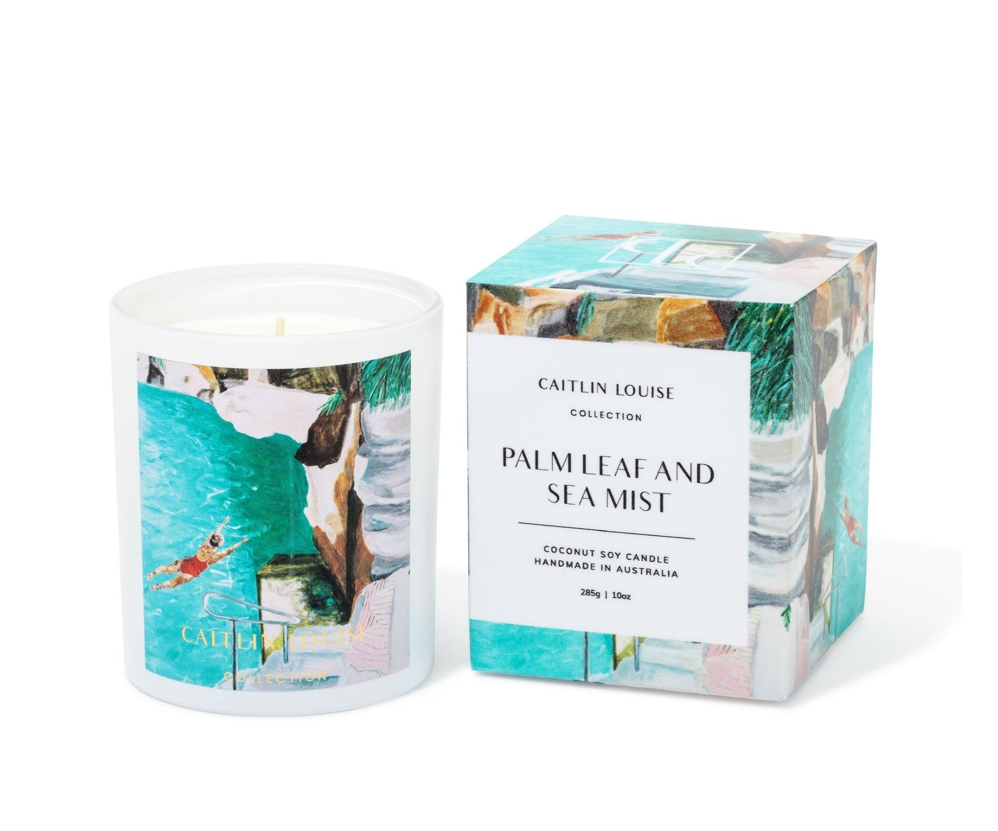 Candle with packaging labeled 'Palm Leaf and Sea Mist' by Catein Louise on a white background